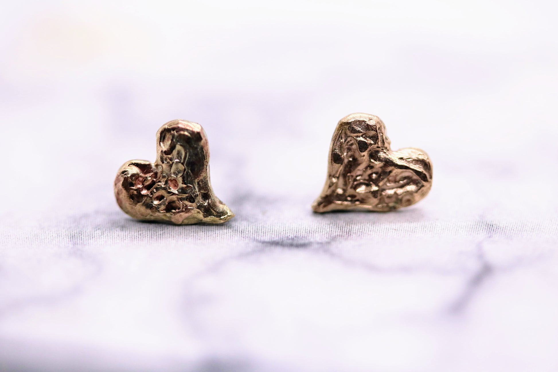 solid gold earrings for charity
