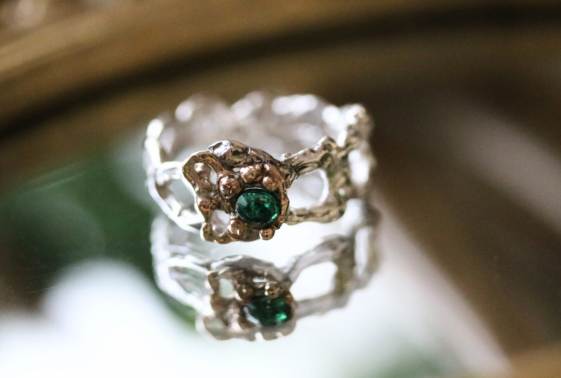 gold emerald silver ring
