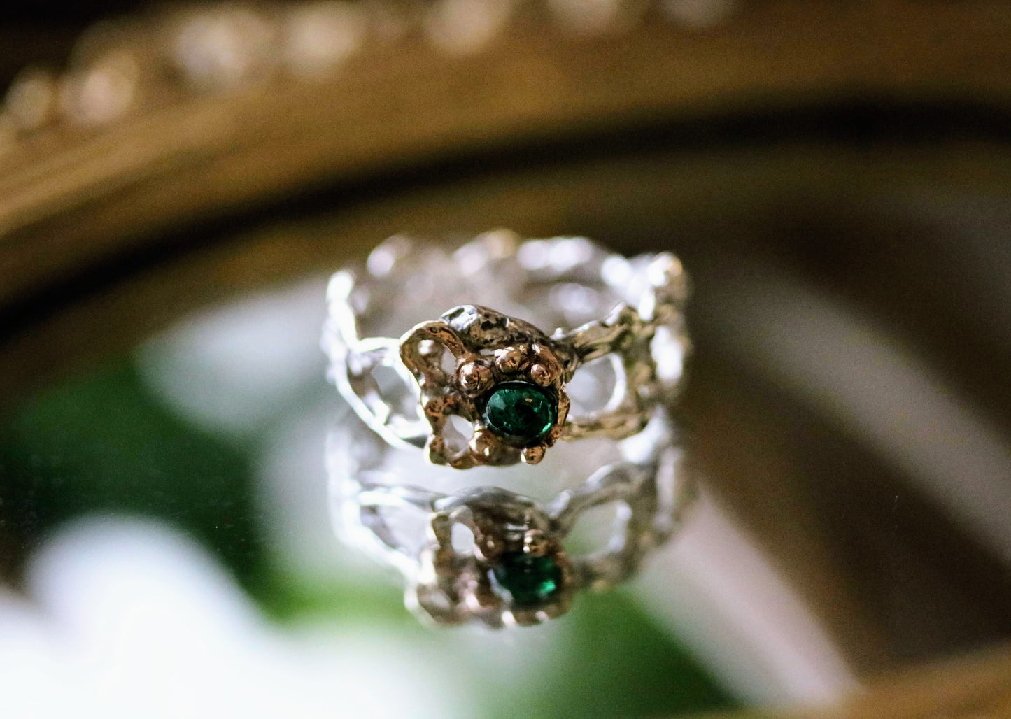 statement ring with emerald
