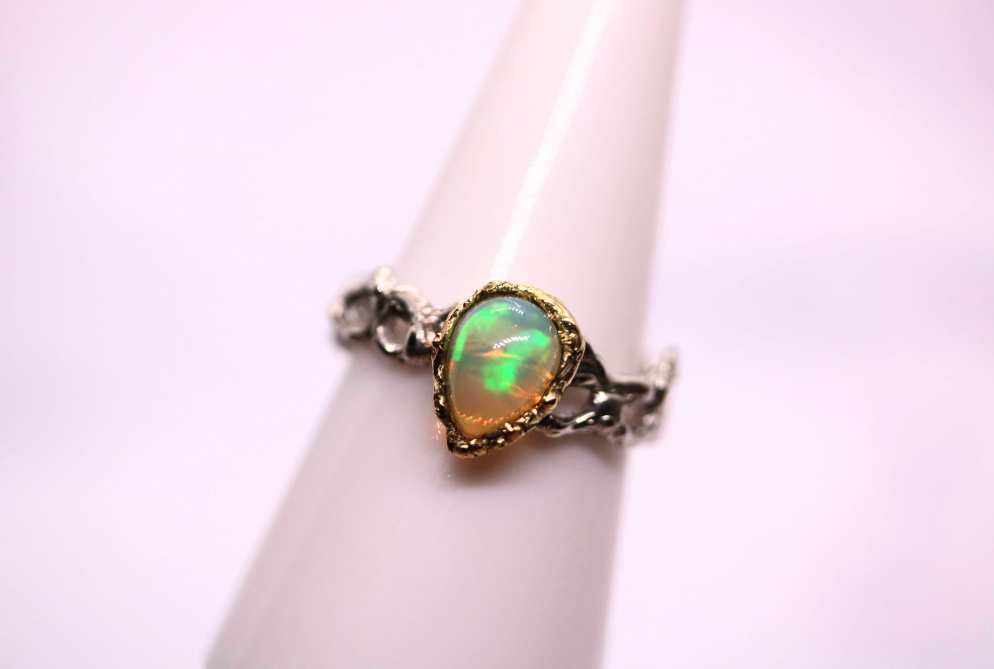 Ethiopian opal gold and silver ring
