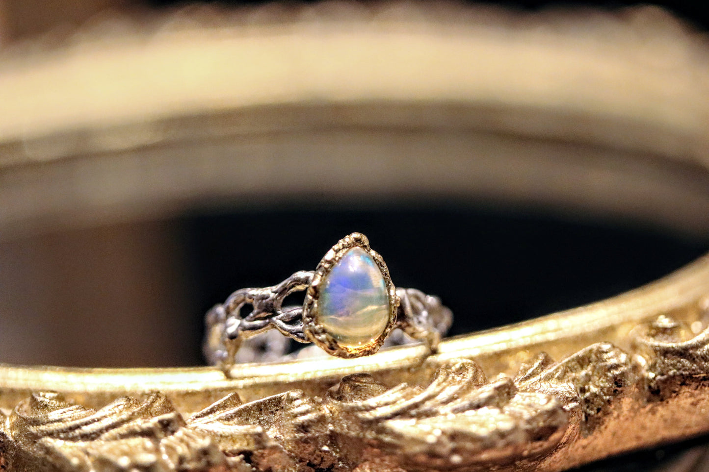 opal teardrop gold and silver ring
