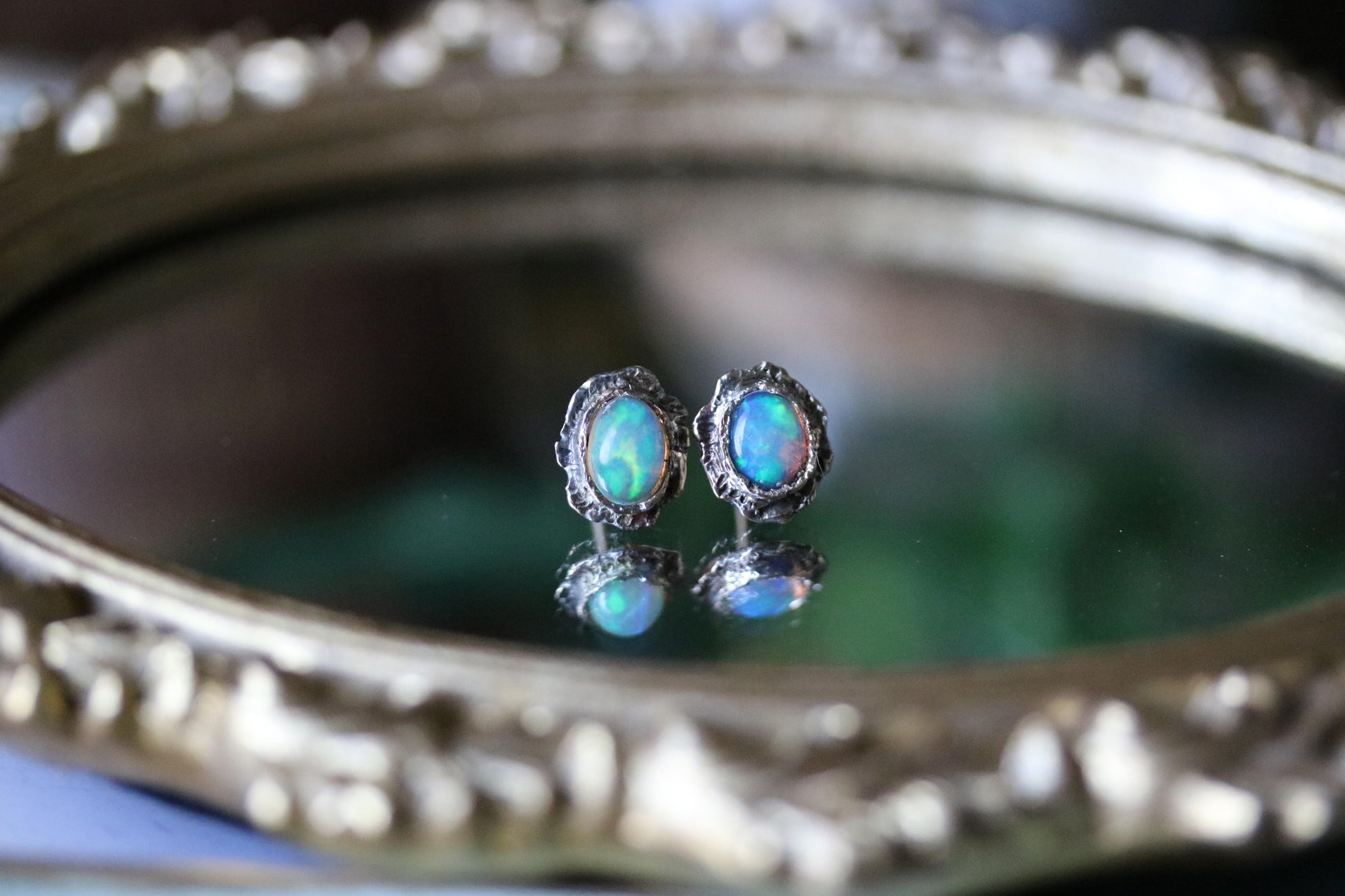 Ethiopian opal gold earrings