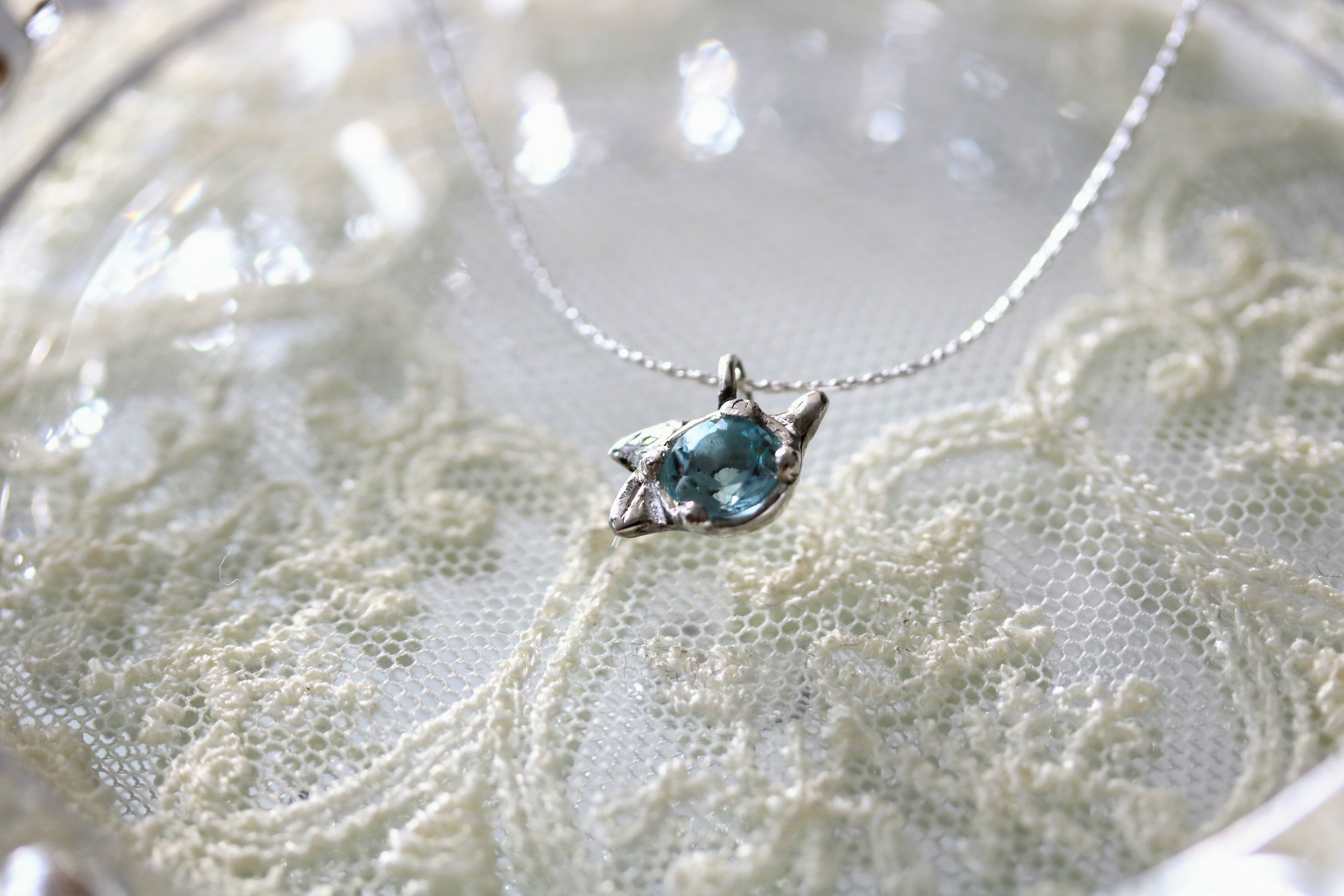 Blooming Buds Blue Topaz Silver Pendant Necklace