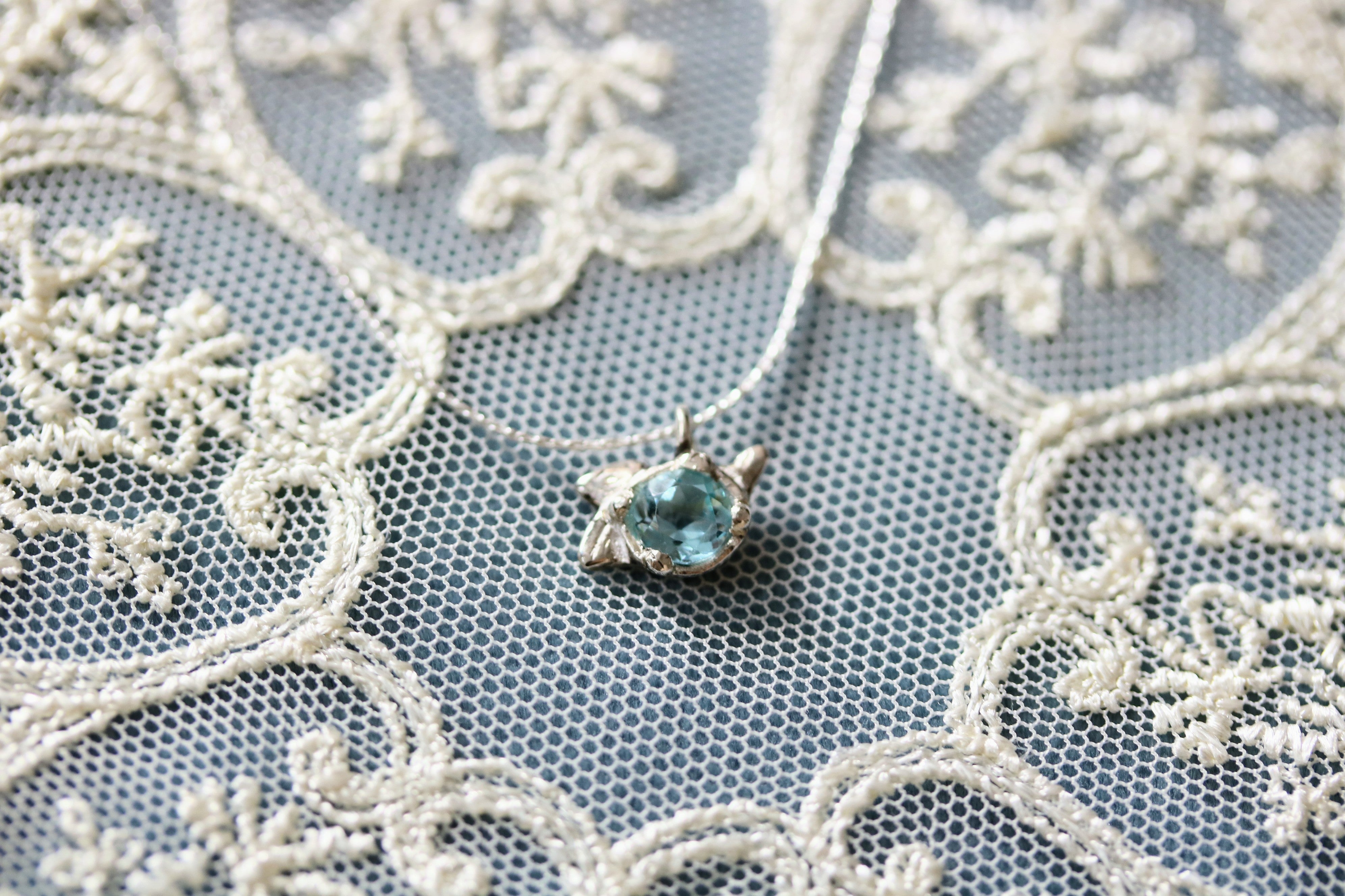 Blooming Buds Blue Topaz Silver Pendant Necklace