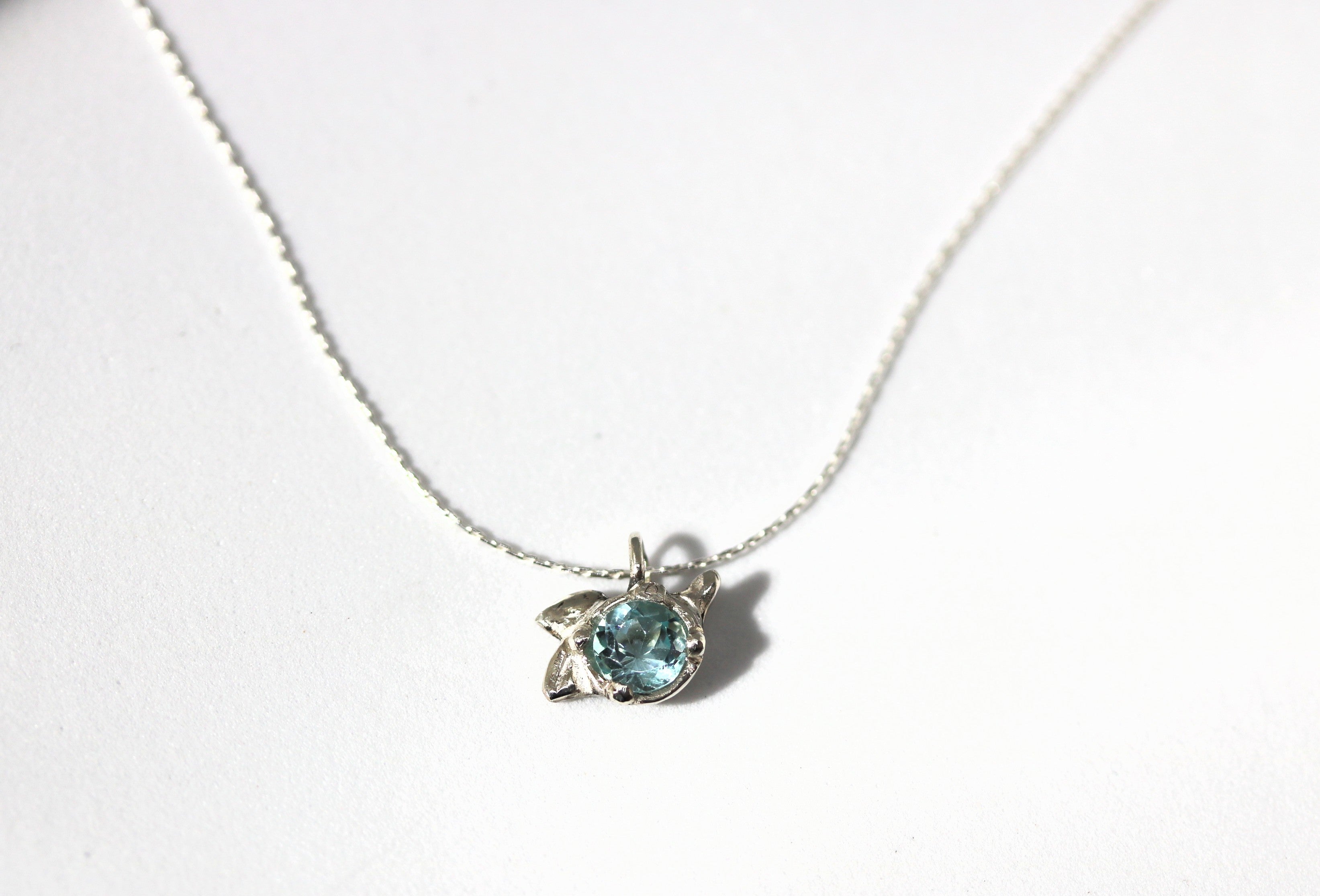 Blooming Buds Blue Topaz Silver Pendant Necklace