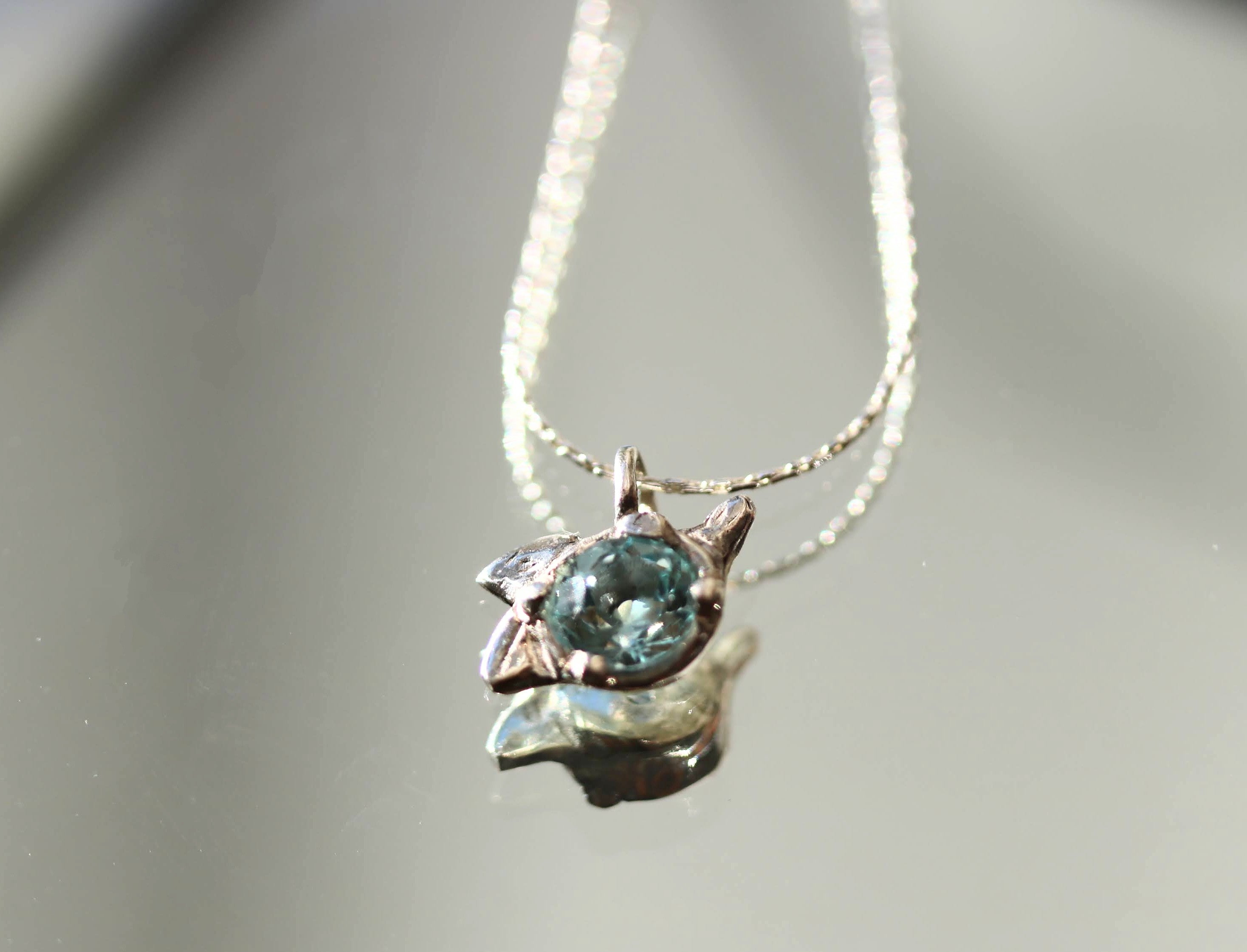 Blooming Buds Blue Topaz Silver Pendant Necklace